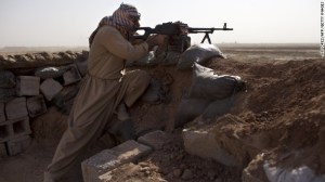 A Kurdish Peshmerga fighter holds a position Thursday, September 11, in Yangije, Iraq against ISIL. Photo from CNN.