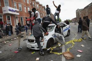 Images like this, of protesters celebrating atop a smashed police cruiser, terrify white people and give the news ratings. But such destruction of property is paltry in comparison to violence the state visits on citizens.