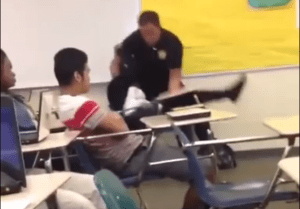 #AssaultAtSpringValleyHigh: a school resource officer slams a student and her desk to the floor.