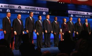 GOP candidates line up at their most recent debate with the oddly appropriate tagline, 